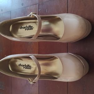 Tan Patent Leather Baby Doll Heels.